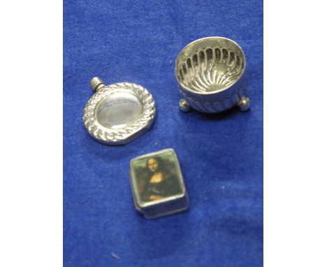 Bag containing small silver salt, scent type bottle and silver patch box with Mona Lisa decoration. 