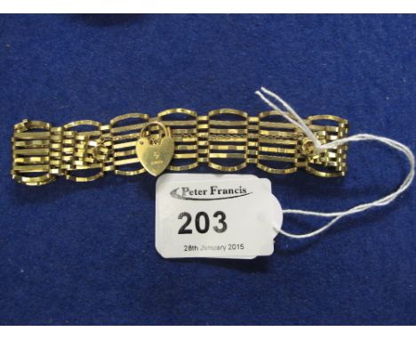 9ct gold seven bar gate bracelet.  CONDITION REPORT; 10.7 grams