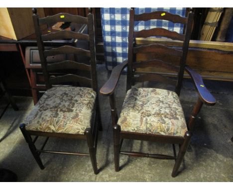 Harlequin set of six (4 +2) similar stained beech ladder backed dining chairs with tapestry seats. (6)