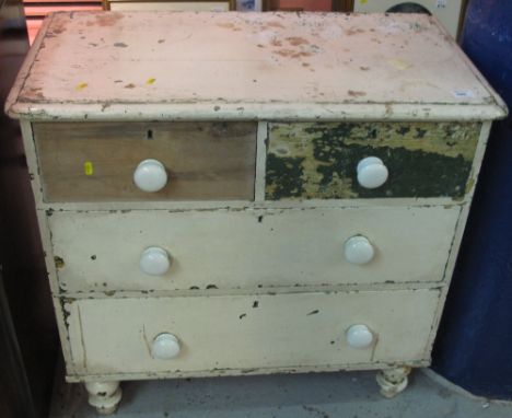 Victorian pine chest of two small and two long drawers with ceramic knob handles on baluster turned legs. 