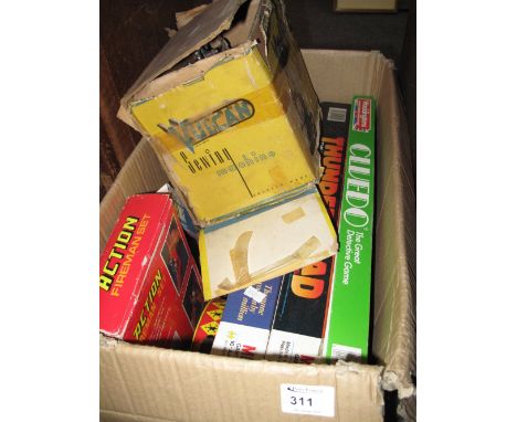 Box of assorted toys and games to include vintage Vulcan tinplate sewing machine in original box, action fireman set, various