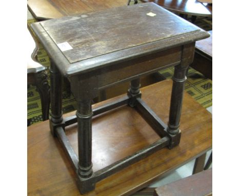 Oak rectangular coffin or joint stool on turned legs and supports, labelled R.Morgan Ltd Worcester.

