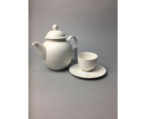VILLEROY & BOCH PART TEA SERVICE, comprising 2 teapots, 13 cups, 19 saucers, and sugar