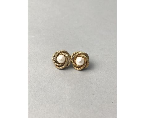 PAIR OF PEARL STUD EARRINGS, each set with a single white spherical pearl 5.8mm diameter to a textured ropetwist setting, mar