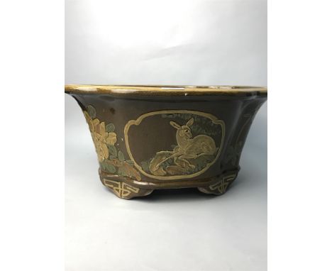 LARGE CERAMIC PLANTER, with foliage decoration and depicting a deer in low relief