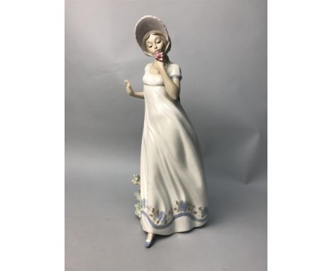 LARGE NAO FIGURE OF A GIRL, along with six other ceramic figures including Doulton and Lladro (7)