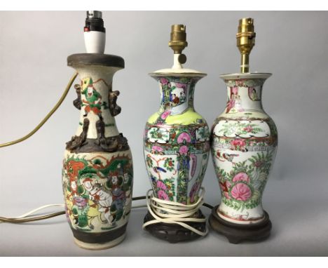 TWO FAMILLE ROSE VASES, converted to lamps; along with a crackle ware lamp decorated with figures (3)