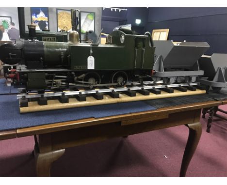 LARGE MODEL STEAM ENGINE, on a section of track
