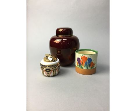 ROYAL CROWN DERBY TABLE LIGHTER, along with a Clarice Cliff jar, a Carlton Ware lidded ginger jar, etc