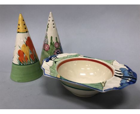 TWO CLARICE CLIFF CONICAL SUGAR CASTERS, along with a Clarice Cliff dish (3)