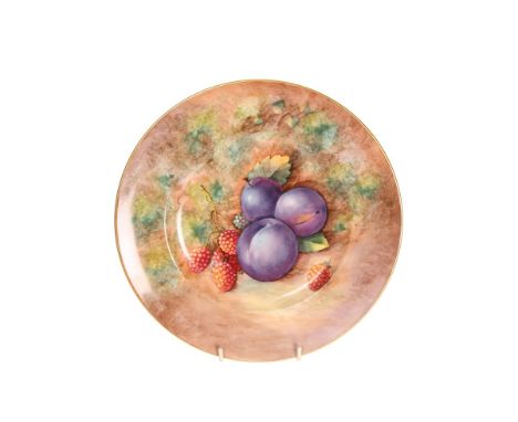A ROYAL WORCESTER FRUIT PAINTED PLATE, painted by Cook, decorated with plums and raspberries within a plain gilt rim, black p