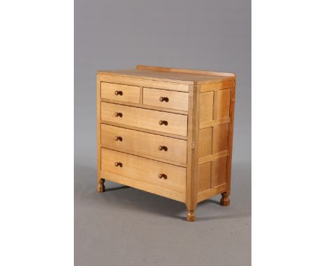 ROBERT THOMPSON OF KILBURNA MOUSEMAN OAK CHEST OF DRAWERS, with two short drawers over three long graduated drawers, panelled