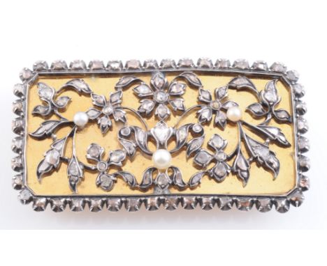 AN EARLY 19TH CENTURY DIAMOND AND PEARL BROOCH, the large rectangular plaque with applied mounts of symmetrical floral design