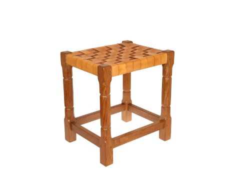 A SID POLLARD OAK STOOL, with leather strapwork seat and faceted legs continuing to blocks.