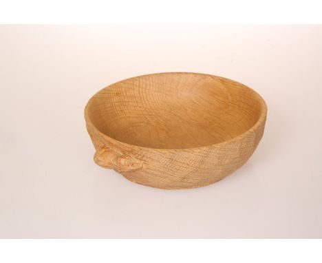 ROBERT THOMPSON OF KILBURNA MOUSEMAN OAK NUT DISH, circular, adzed to the exterior, with carved mouse signature. 15cm