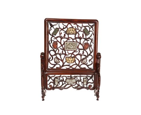 A CHINESE JADE, HARDSTONE AND IVORY INSET HARDWOOD TABLE SCREEN, LATE 19th CENTURY, the square fret-carved sliding panel inse