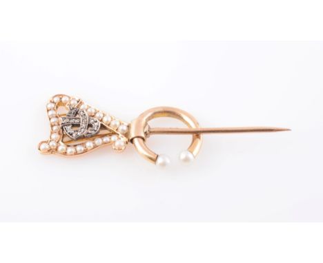 A 19TH CENTURY SEED PEARL AND DIAMOND PIN, modelled as harp set throughout with graduating seed pearl highlights, the centre 