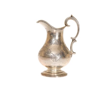 A LARGE VICTORIAN SILVER CREAM JUG, LONDON 1841, of baluster form, with leaf-capped double scroll handle and engraved decorat