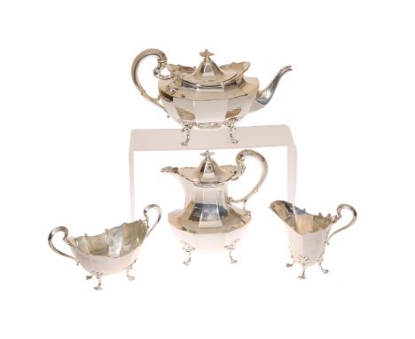 A GOOD GEORGE V SILVER FOUR-PIECE TEA SERVICE, Pearce & Sons, London 1911 and 1912, comprising teapot, hot water pot, cream j