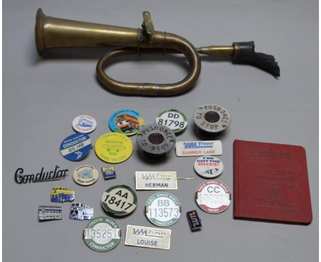Mixed lot of automobilia including a vintage car horn, Bus conductor badges etc.