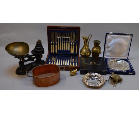 Two boxes of assorted metalware including silver plated cutlery sets, scales etc.