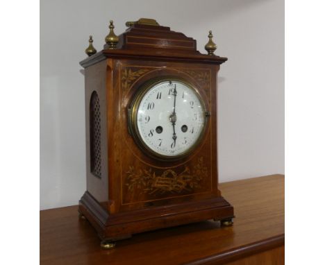 A Regency-style mahogany Bracket Clock, the case with gilt-metal mounts and floral inlays,&nbsp; converted to electric, H:34c