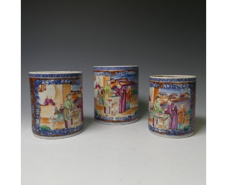 A set of three antique Chinese porcelain Mandarin pattern Tankards, graduated in size, decorated with scenes of figures, land