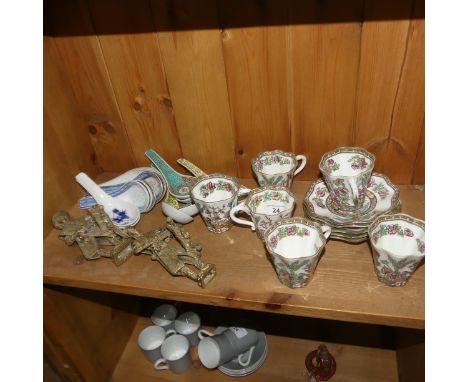 A dimpled brown glass Bottle, together with a blue glass Bottle, six Coalport Chinoiserie pattern Coffee Cans and Saucers and
