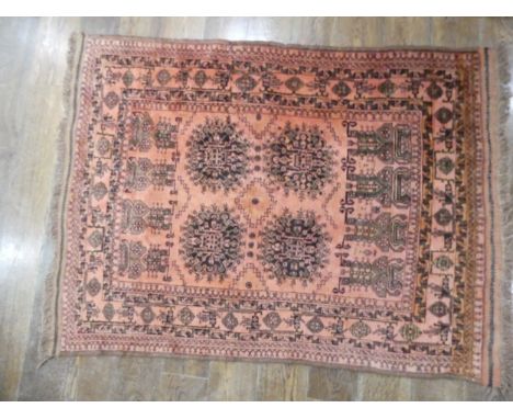 Tribal rugs;&nbsp;an Afghan Rug, hand-knotted with tekke and geometric designs on a light red ground, 100% wool,&nbsp;in fair