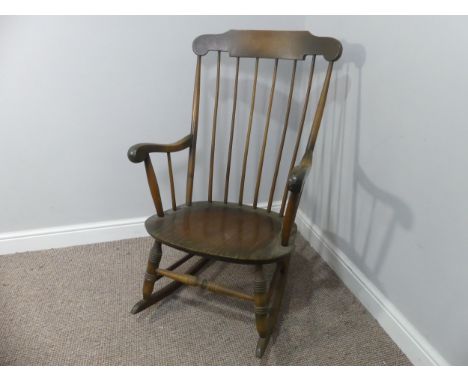 A vintage stick back rocking chair, W 63cm x H 102cm x D 74cm. 