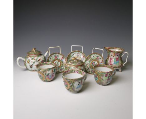 An antique Chinese porcelain matched famille rose Tea Set, comprising three near matched Tea Cups and Saucers, Sucrier, Cream