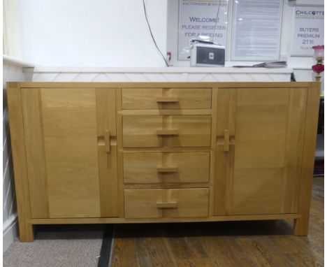 A modern light oak art deco style John Lewis Side Board, with dovetail joints,  W 165.5cm x H 88cm x D 46.5cm. 