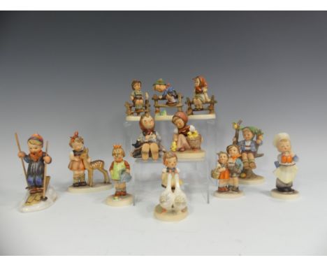 A small quantity of Hummel Figures of Children, depicted engaging in various sporting and recreational pursuits (12) 