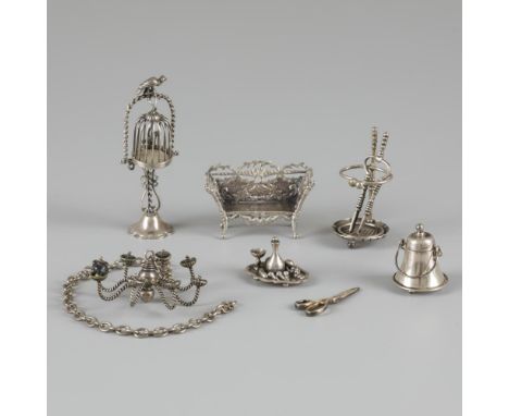 In various versions, including: a bench, tray, scissors, chandelier and bird cage. Italy / Netherlands, 20th century, hallmar