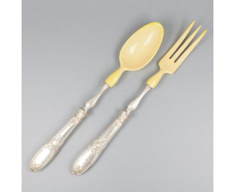 Beautifully executed with filled handles with floral decorations and plastic bowls / tines and blades. France, Paris, Joseph 