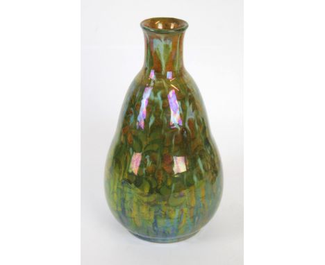 A unusual Pilkingtons Royal Lancastrian vase 
Of bulbous form with cylindrical neck, decorated with Art Nouveau and floral mo