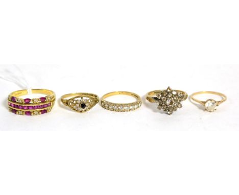 A 9ct gold ruby and diamond band ring, finger size T and four 9ct gold gem set rings (5)Gross weight 10.4 grams 