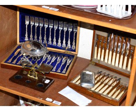 A cased set of fruit knives and forks, a cased set of fish cutlery, postal scales, hips flask and a small Victorian plated ro