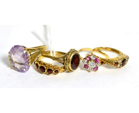 A 9ct gold amethyst ring, finger size M1/2 and four other 9ct gold gem set rings (5)13.2g gross