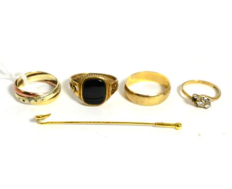 A 9ct three colour gold band ring, a 9ct gold band ring, a 9ct gold signet ring, a diamond ring (one diamond loose but presen