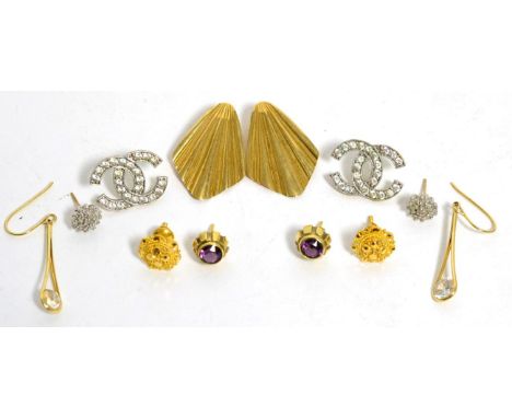 A pair of 9ct gold diamond cluster earrings, a pair of 9ct gold fan shaped clip earrings, a pair of amethyst earrings, a pair