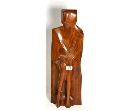 A 20th century carved wood abstract figure stamped to base R W Goodall NDD ATD