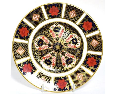 A Robert ''Mouseman'' Thompson oak ashtray together with a Royal Crown Derby Imari plate 