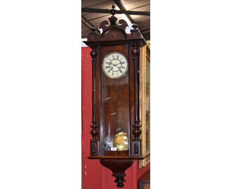 A Vienna wall clock by Lenzkirch serial no. 362541, retailed by W.T.Campbell, enamelled dial, Roman numerals, key and pendulu
