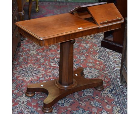 An early Victorian mahogany invalid table, rounded rectangular top with adjustable plateau, panelled column, turned socle, in