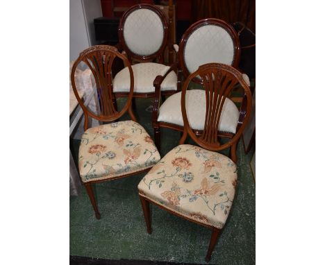 Two reproduction mahogany open arm chairs; a pair of Edwardian satinwood salon chairs; a pine dressing mirror.