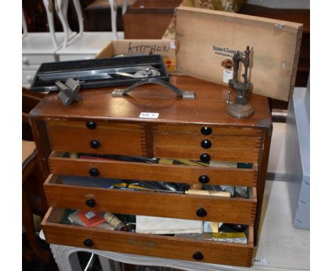 A Moore and Wright engineer's box, eight drawers containing assorted engineering tools including tap wrenches, taps, dividers