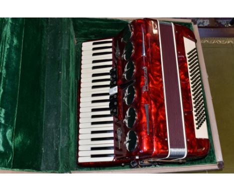 A Parrot piano accordion red marbleized case, 120 buttons, cream details, cased 