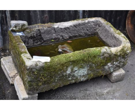 A 19th century Derbyshire gritstone trough,  28cm high, 90cm long, 51cm wide 