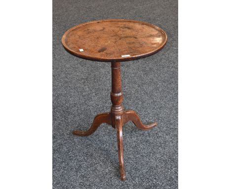 A George III small oak tilt top tripod table, c.1800